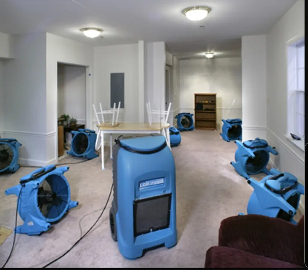 Air movers and dehumidifier setup for Water Damage Restoration in Frankford